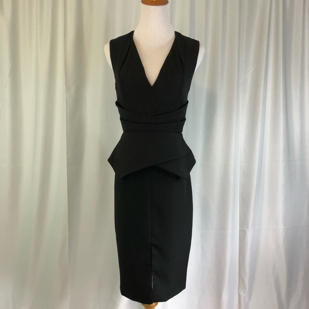 Low Neckline Peplum Dress